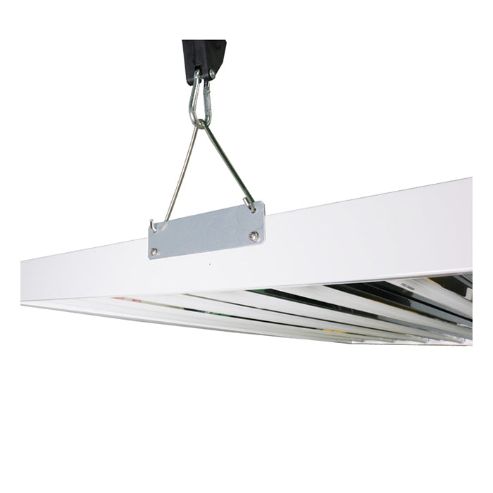 A 4x8 Lightech T5 grow light fixture hangs from a carabiner and cable.