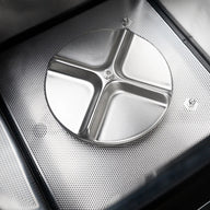 Mini Osprey 2.0 with stainless steel turntable and perforated heating surface.