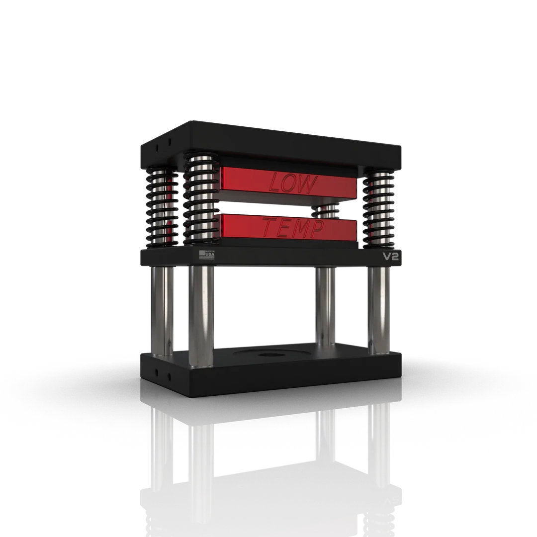 Black and chrome low-temperature press with "LOW TEMP" text on red plates.