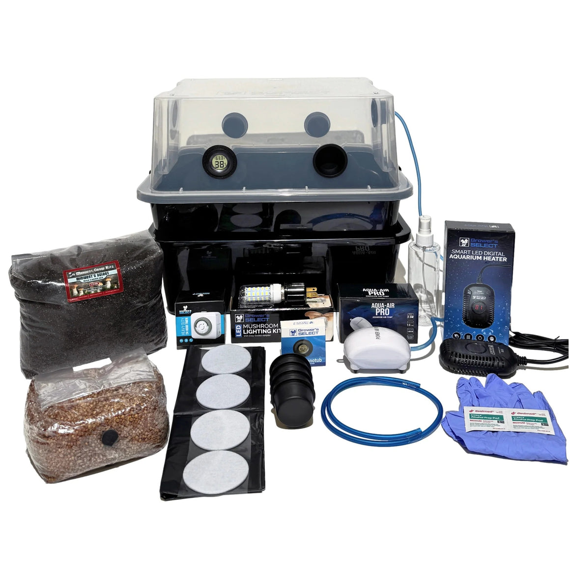 Mushroom growing kit with clear-top humidity tent, substrate bags, LED light, timer, air pump, heater, and gloves.