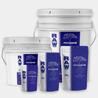RAW Potassium Power fertilizer in white buckets and blue bags with tree root logo.