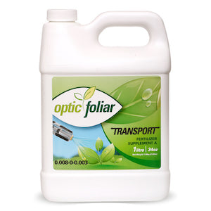 White jug of Optic Foliar Transport fertilizer, 1 litre/34oz, with green leaf logo and spraying nozzle.