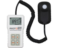 White PAR meter with black sensor and coiled cord displays 897.3 µmol/m²/s.