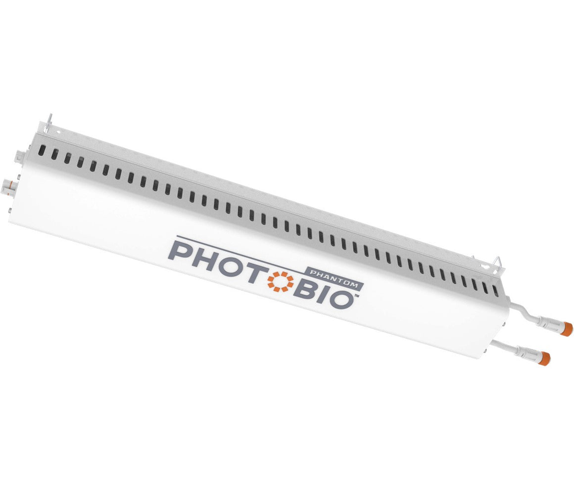 White photobio TX-LED 680W driver with orange connectors, on white background.