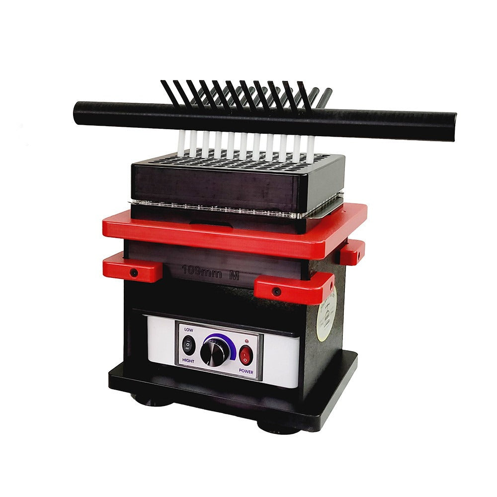 Laboratory device for filling and folding cigarette tubes, with a black rack and white tubes.