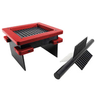 Magic trick with a square wooden stand with a red frame and a black arrow-shaped wand with white and black fletching.