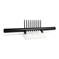 A black cylinder with white prongs extending downwards, and black prongs extending upwards.