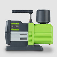 Green and gray dual-stage vacuum pump with a black handle and textured cap.
