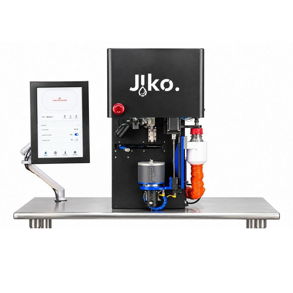 Jiko Plus machine with touchscreen, emergency stop, and robotic arm.