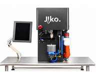 Black Jiko Plus machine with monitor on stainless steel table.