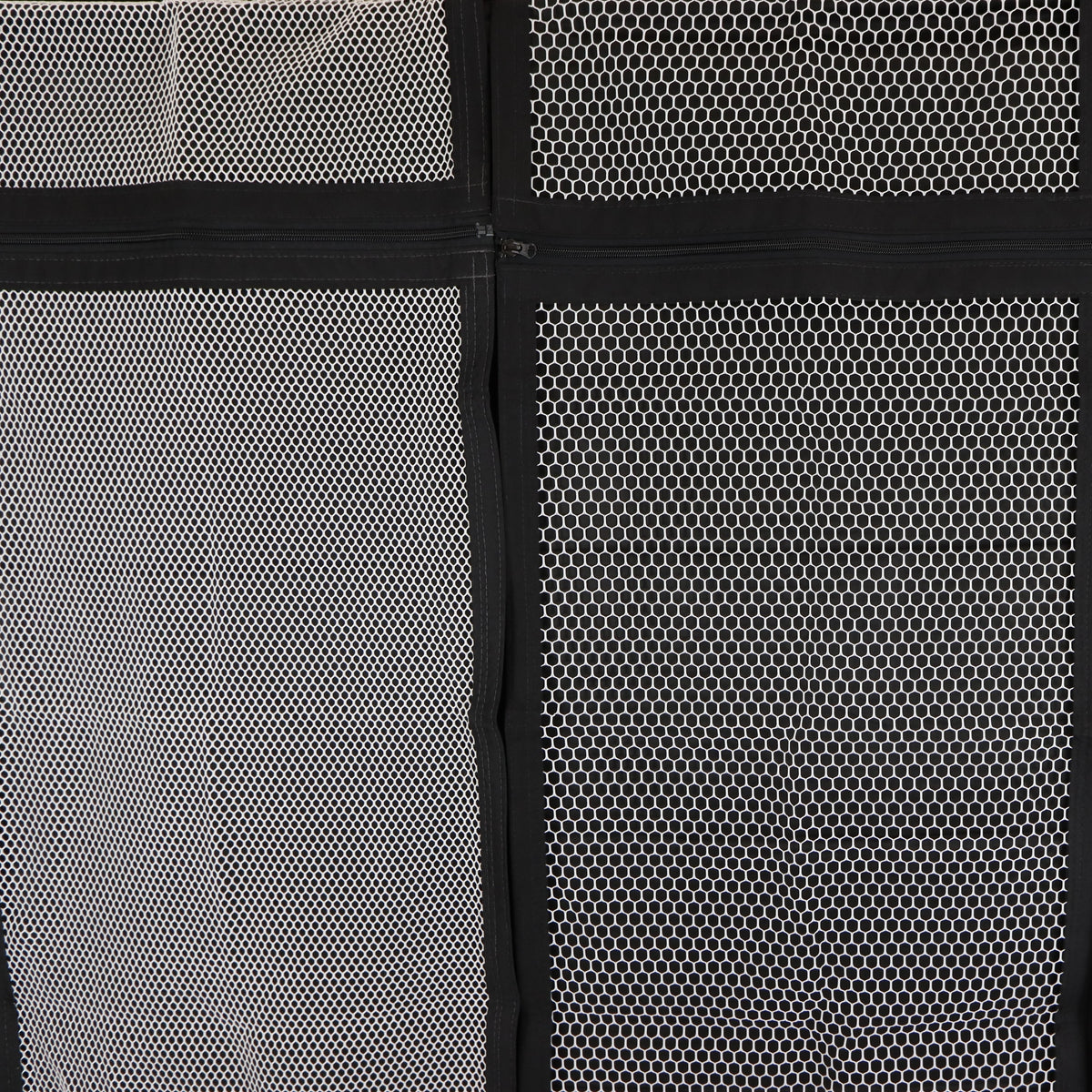 Close-up of two white mesh panels with black borders and zippers.
