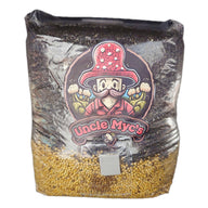 Uncle Myc's CVG mushroom grow bag with cartoon mushroom man logo and yellow grain spawn at bottom.