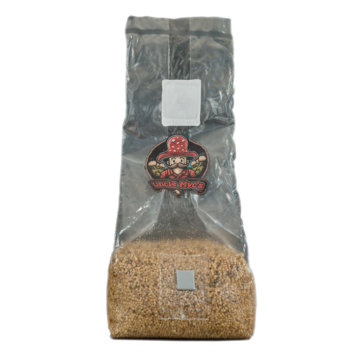 Uncle Myc's Millet Grain 2lb sterilized mushroom spawn bag with logo.