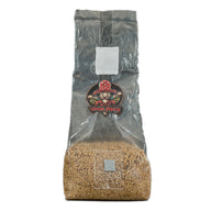 Uncle Myc's Millet Grain 2lb sterilized mushroom spawn bag with logo.