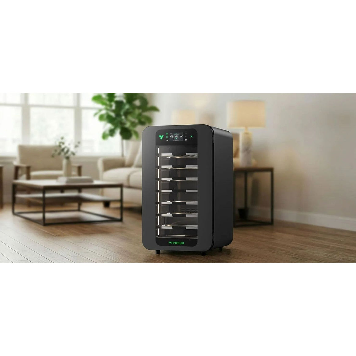 A black VIVOSUN dehydrator sits on a wood floor in a living room.