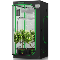 VIVOSUN grow tent with LED light, fan, and two plants in pots.