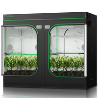 A Vivosun grow tent with two separate compartments, each housing rows of potted plants with white flowers.