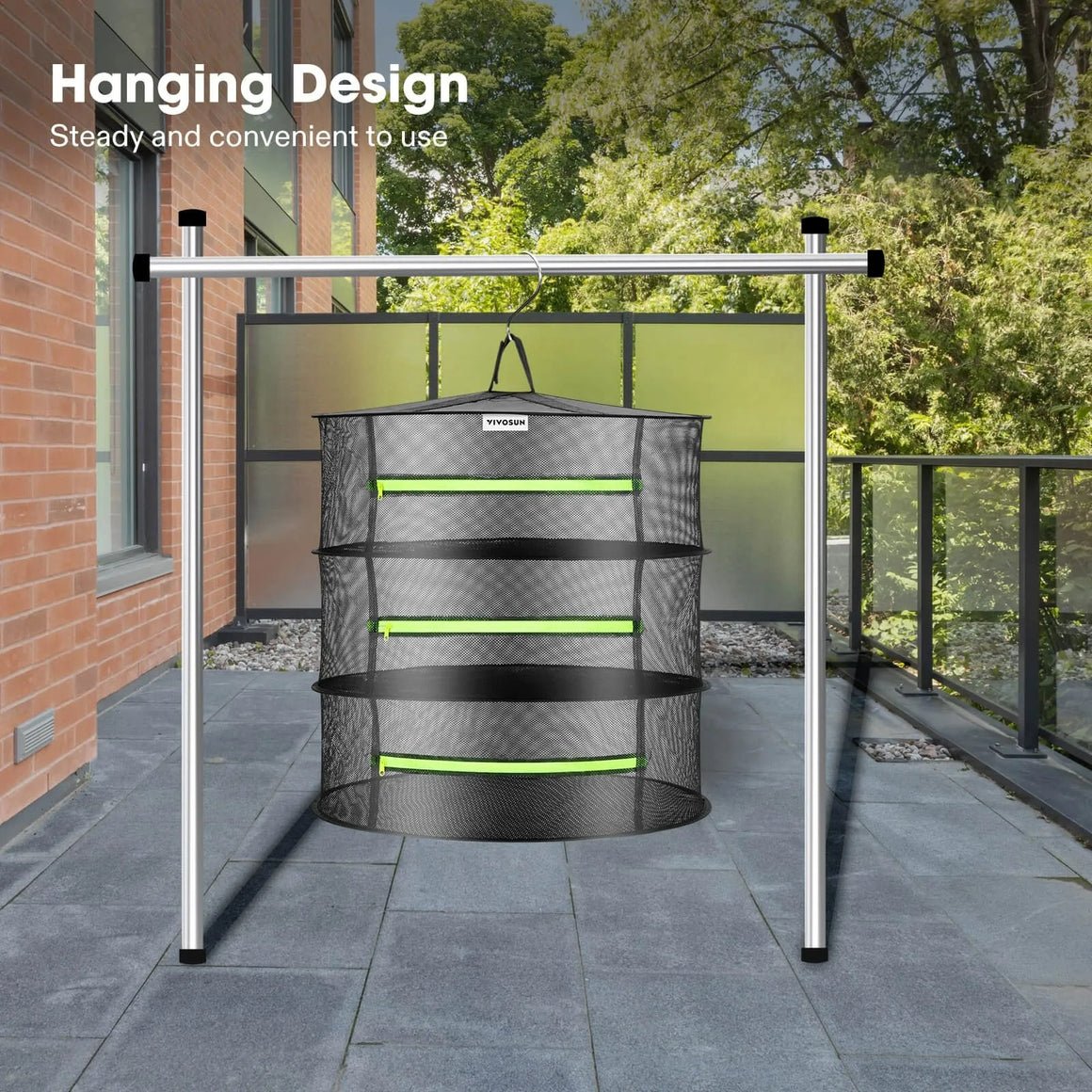VIVOSUN mesh drying rack hanging from a silver metal stand on a patio with trees and greenery in the background.