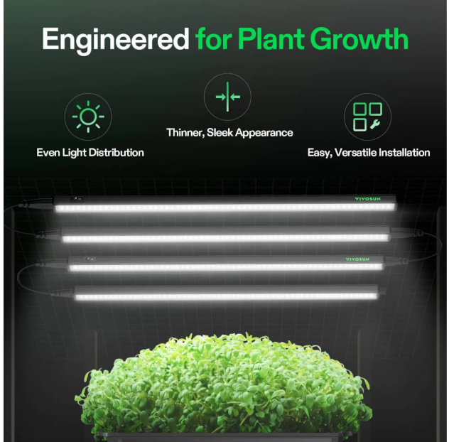 VIVOSUN LED grow lights illuminate a lush green microgreen tray, promoting plant growth.