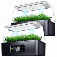 Two modern indoor hydroponic garden systems with vibrant green plants under LED grow lights.
