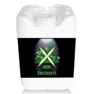 White 5-gallon Grow XNutrients fertilizer jug, black label with green plants, roots, and an 