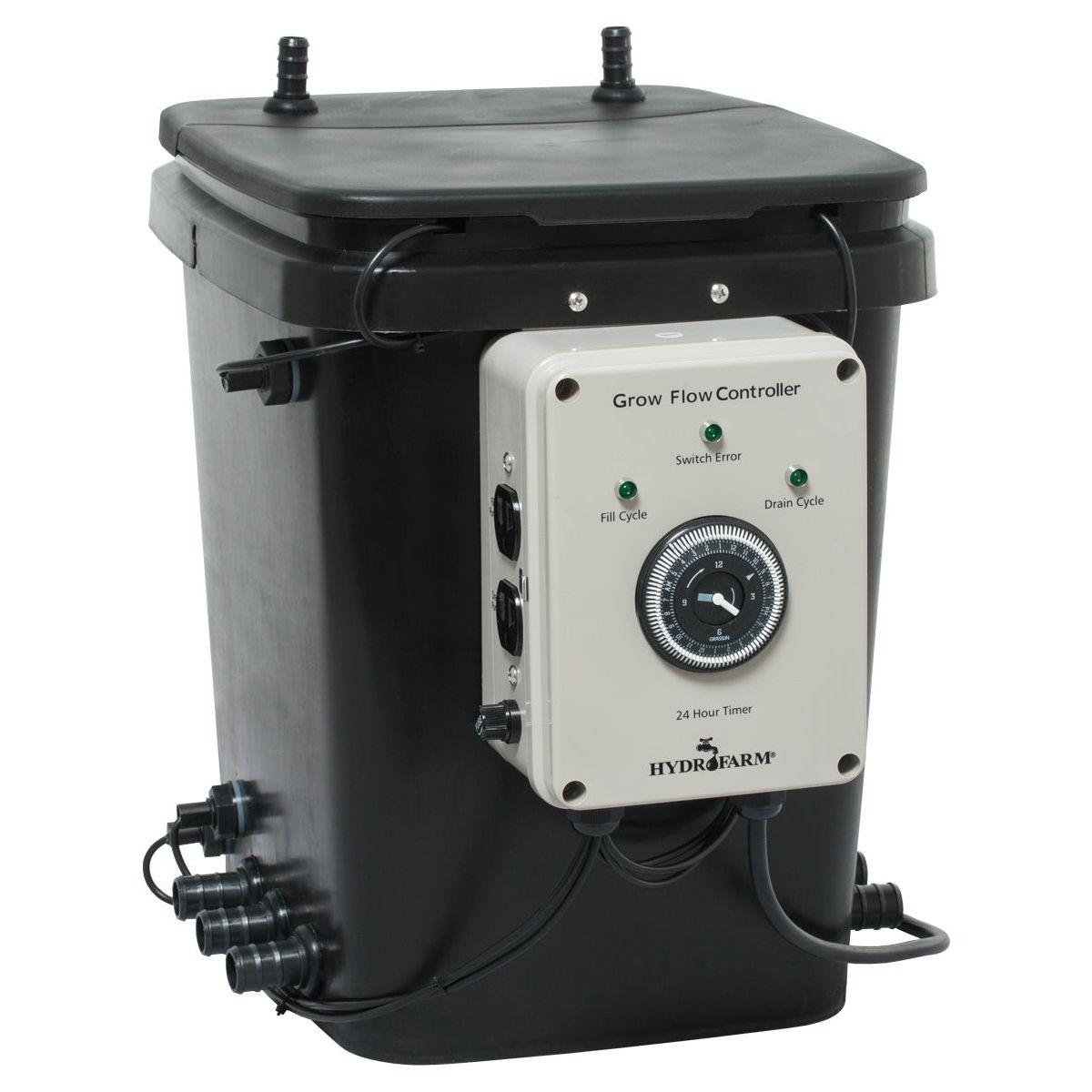 Black HydroFarm Grow Flow controller with timer and green indicator lights on a black reservoir.