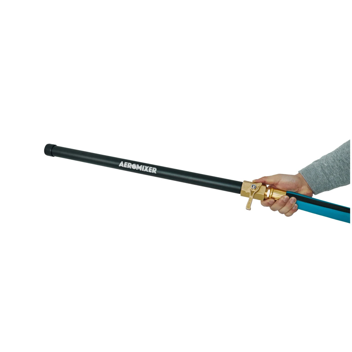 Hand holds black Aeromixer watering wand with brass valve and blue hose attachment.