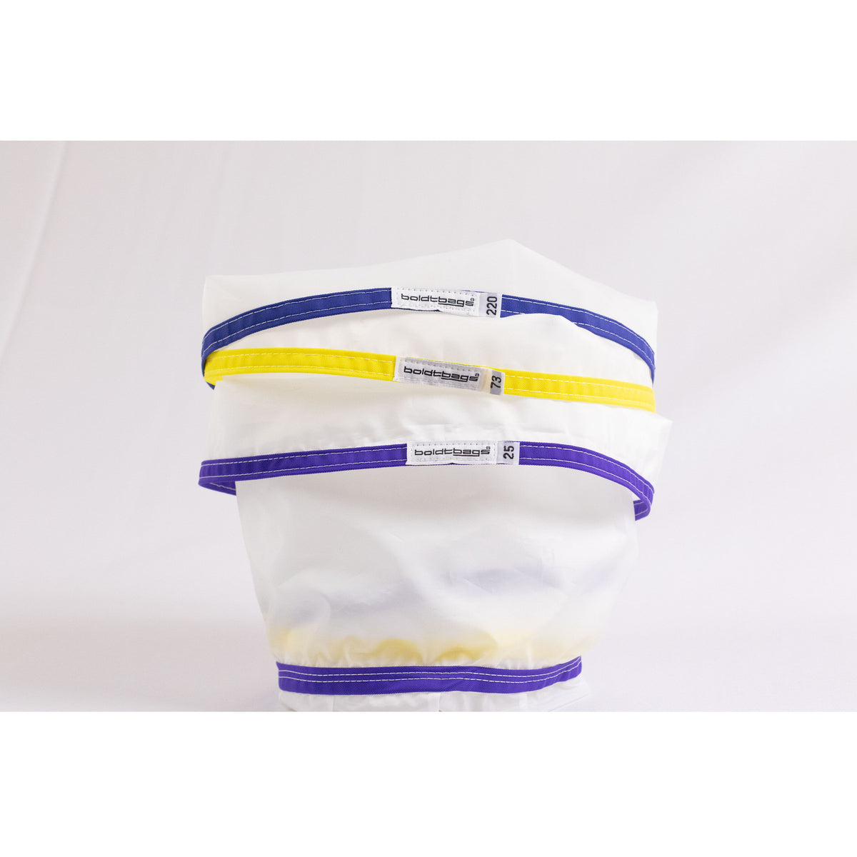 Three stacked mesh bags with colored bands in blue, yellow, and purple.