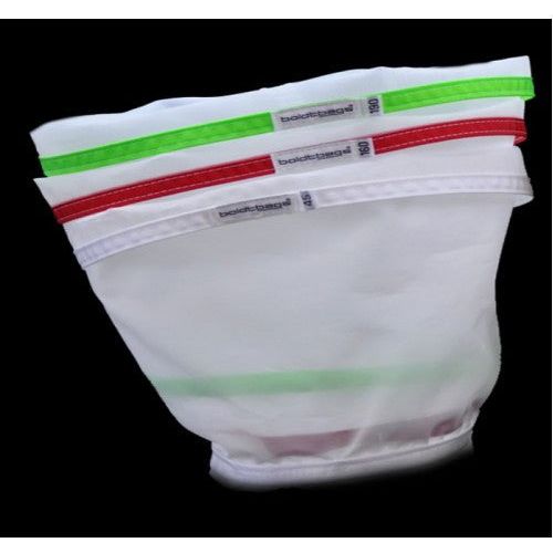 Three white mesh bags with colored hems (green, red, white) stacked on a black background.