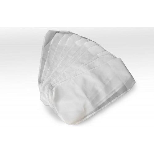 Stack of white freeze-dryer tray liners on a white background.