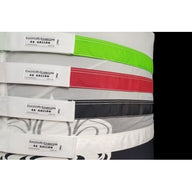 Stack of colorful, labeled Boldtbags 44 gallon mesh stackers in green, red, black, and white.