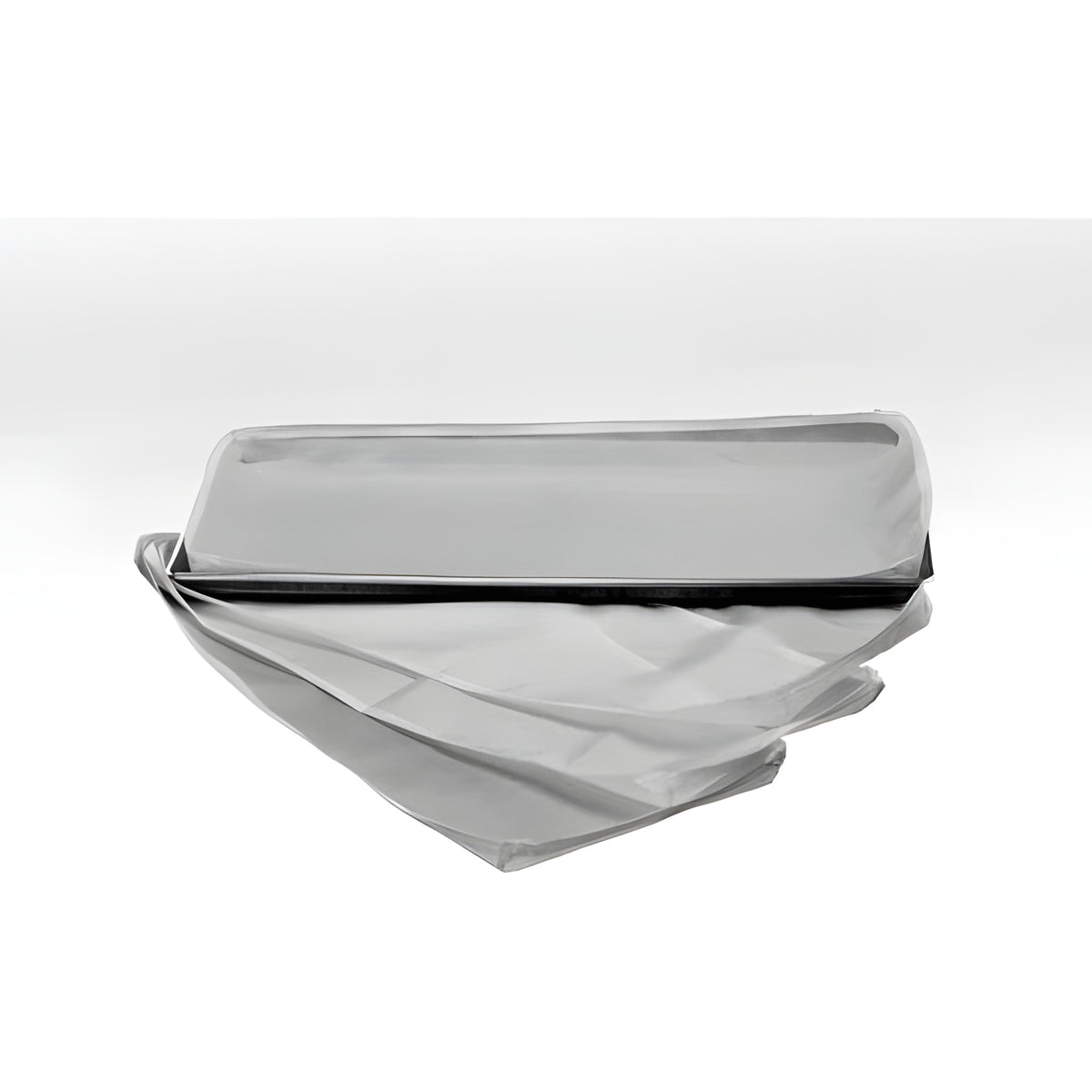 A stack of seven silver-grey, reusable dryer tray liners with a metallic sheen.