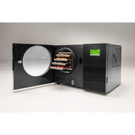 Black Countertop 360 freeze dryer with the door swung open, showing four trays of food in the chamber