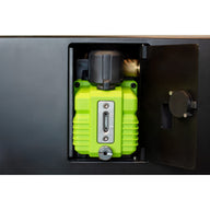 Green vacuum pump behind the access door of the Countertop 360, with the oil sight glass on its front