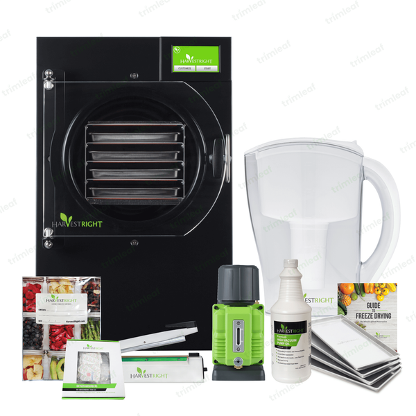 Harvest Right 4-tray small pro freeze dryer with accessories: trays, vacuum pump, oil, mylar bags, and guide.