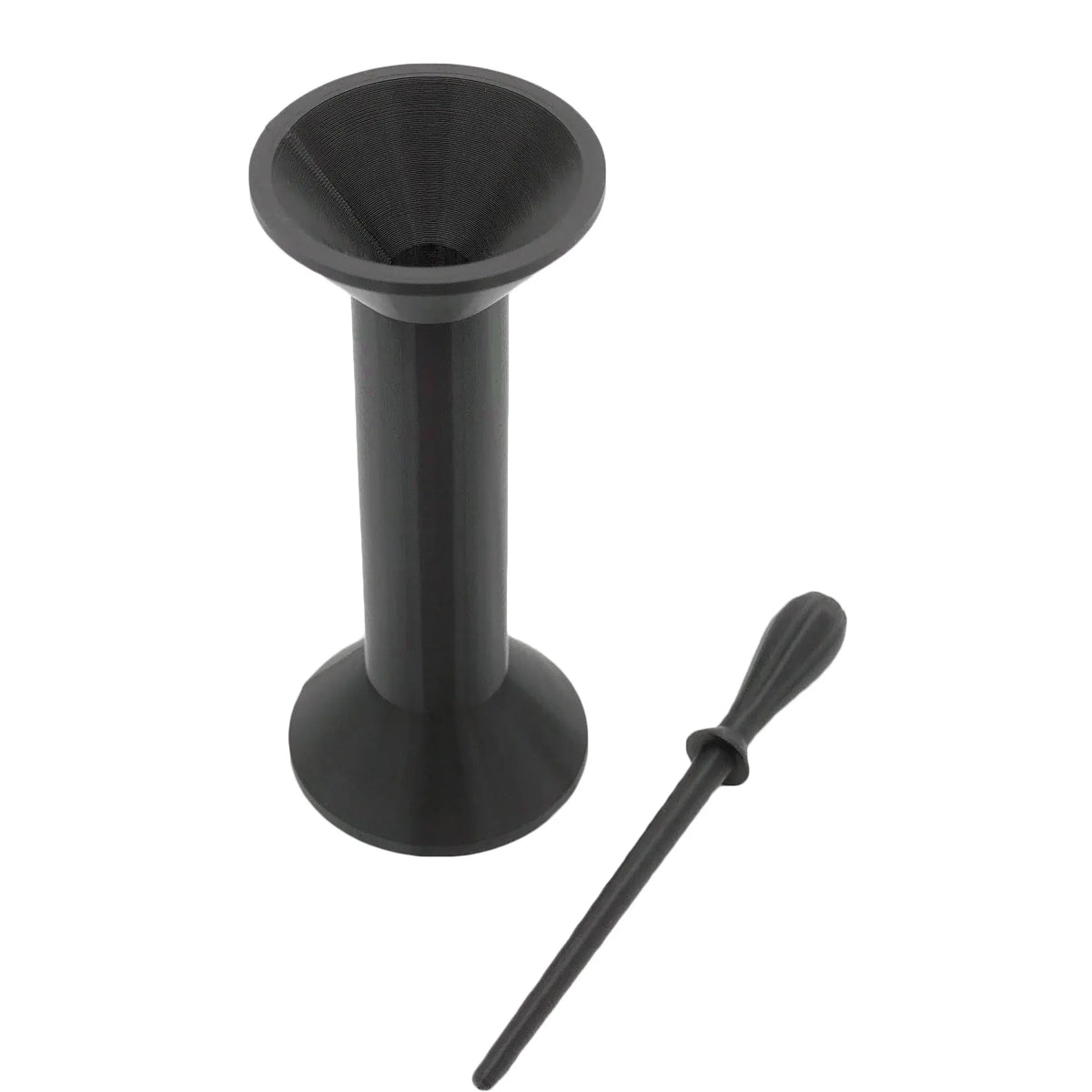 Dark gray cone filler with ridged interior and tamping tool on a white background.
