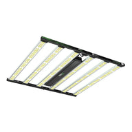 Black and green ILUMINAR Logic Plus full spectrum LED grow light with several bright yellow LED bars, angled view.