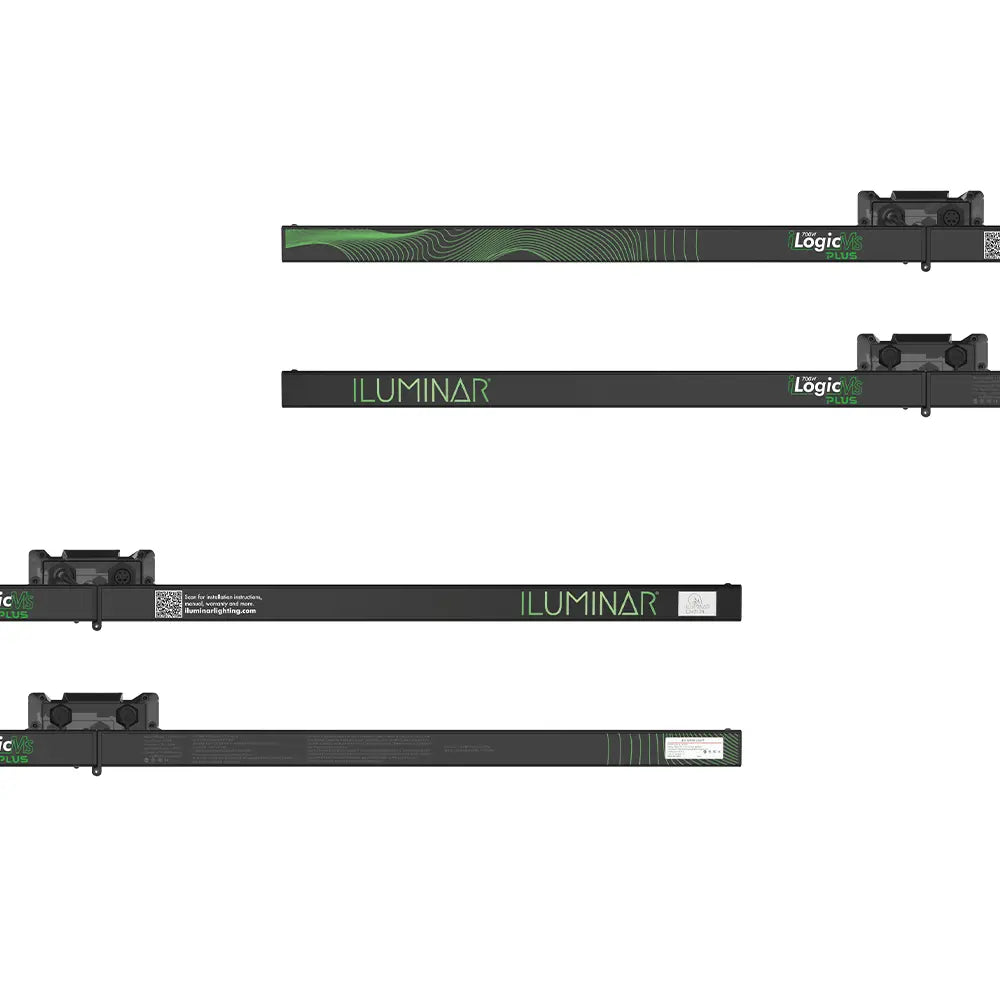 Four ILUMINAR Logic M/S Plus 700W full-spectrum LED grow lights, dark gray bars with green branding and patterns.