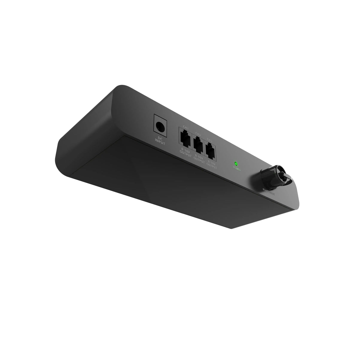 A sleek, dark gray or black electronic control device, likely an adapter or interface, shown from a low-angle perspective against a bright white background. It features a DC INPUT port, three RJ-style ports labeled "CH1", "CH2", and "CH3" with "0-10V OUTPUT" text below each, a green "POWER" LED indicator, and an "RS485 INPUT" port (likely a push-fit or screw-terminal type connector). The device has a matte finish and rounded edges, suggesting a compact and modern design for lighting or system control.
