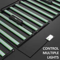 Multiple black ILUMINAR LED grow light fixtures with green bars, connected to an iLogic controller and tablet control.