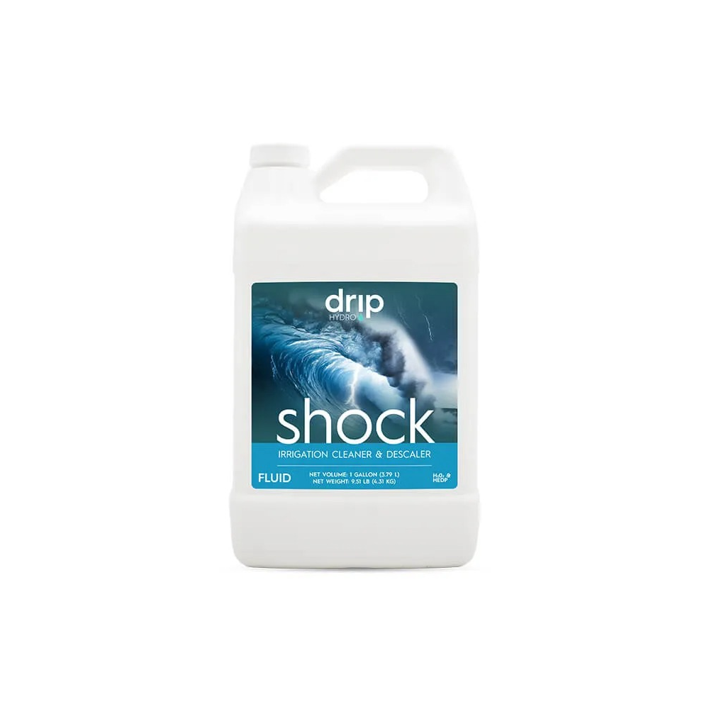 White gallon jug of Drip Hydro Shock irrigation cleaner & descaler with ocean wave label.