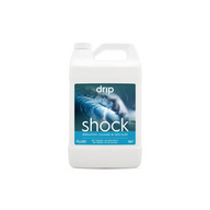 White gallon jug of Drip Hydro Shock irrigation cleaner & descaler with ocean wave label.