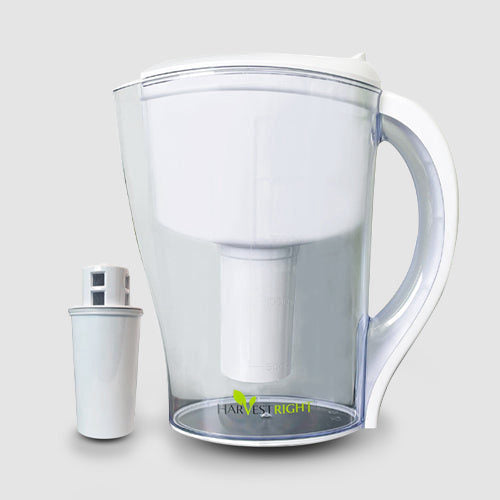 A white and clear water filter pitcher with a separate filter cartridge.