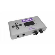 SECRET. Retro Control Smart Bioengineering LED lighting controller. Gray device with display, control buttons, and various ports.