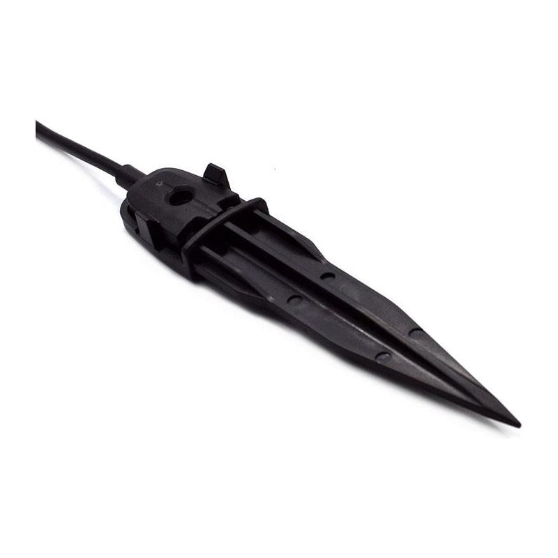 Black plastic spike with a cable for landscape lighting or garden use.