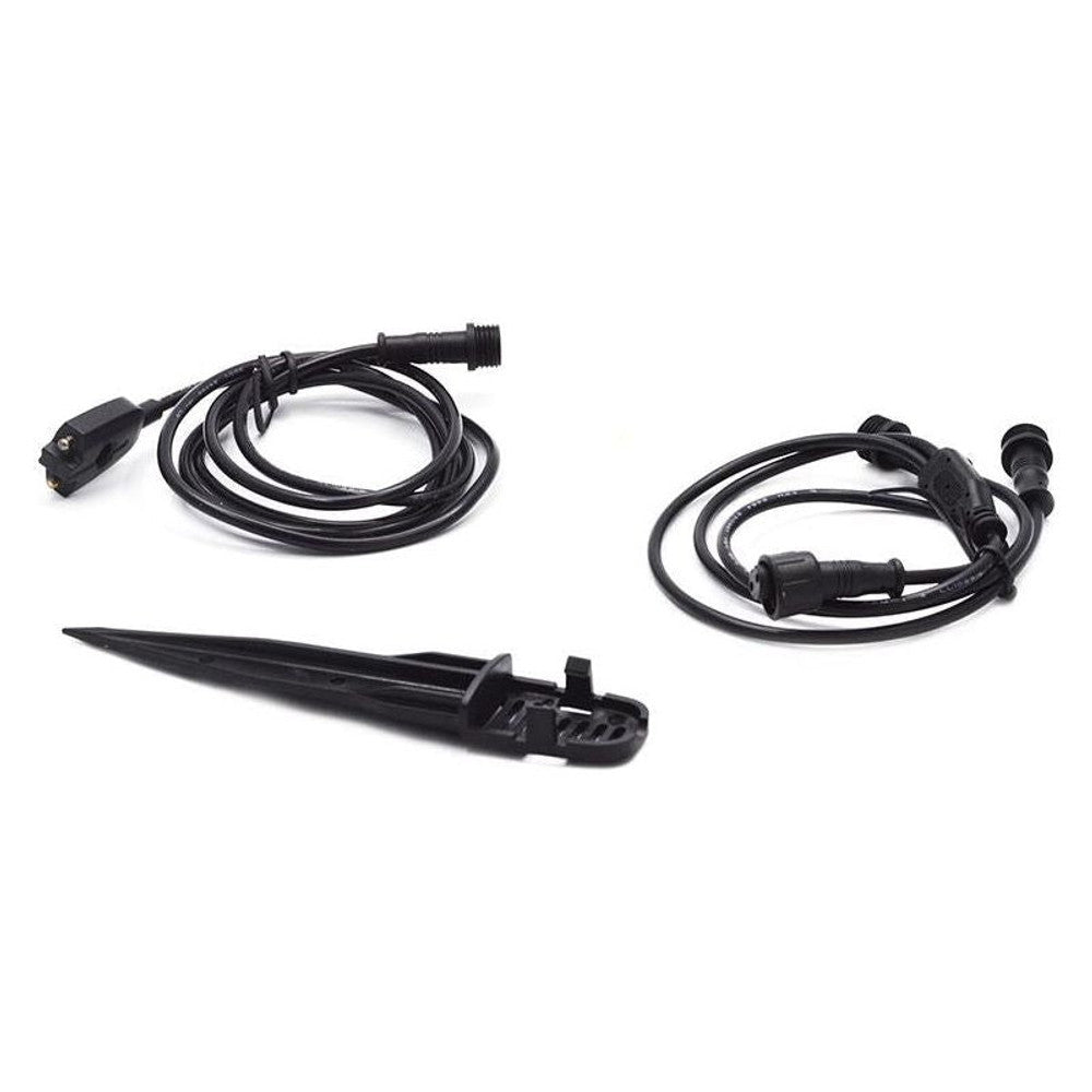 Black garden lights' power cables and stake on white background