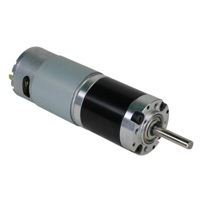Silver and black geared DC motor with metal shaft and ball bearings, isolated on white.