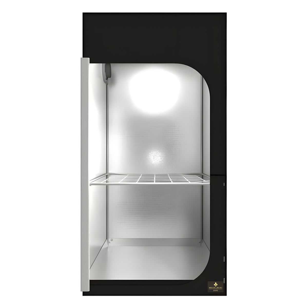 A black grow tent with a reflective interior, a metal shelf, and a light source at the top.