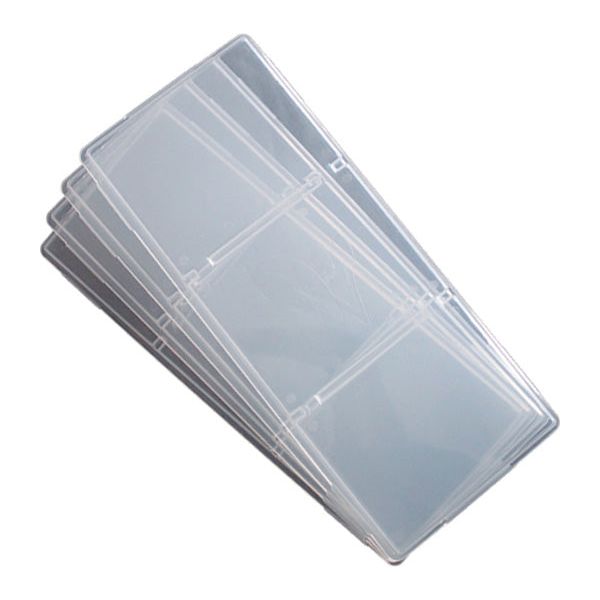 Stack of clear plastic tray lids, each with 6 compartments.