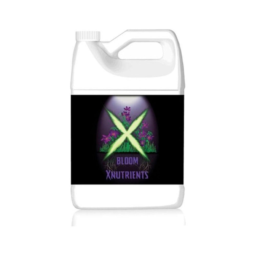 White plastic jug with black label featuring purple flowers, green "X", and "BLOOM XNUTRIENTS" text.